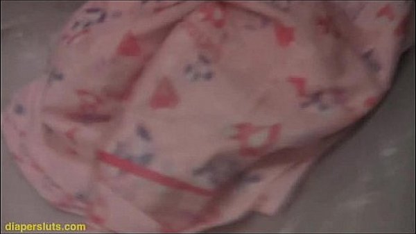 Cute black girl pisses in her diaper