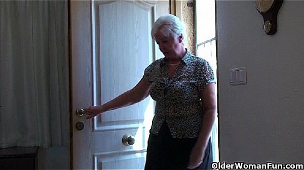 Chubby granny in stockings plays with vibrator