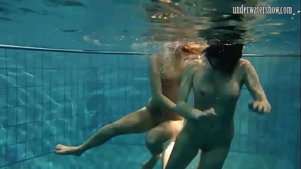 Swimming naked and horny undressing teens in the pool