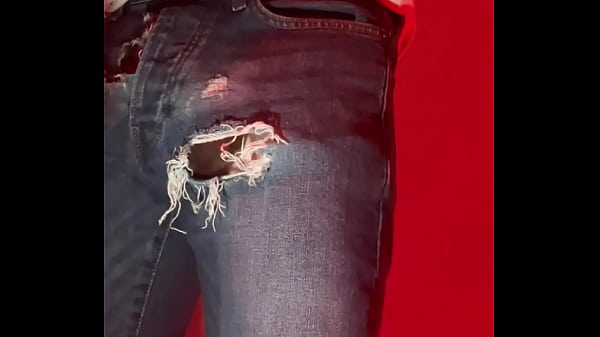 Amateur boy pissing in a condom  