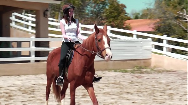 Pretty brunettes Sinn Sage and Jay Taylor sequester themselves in the corral