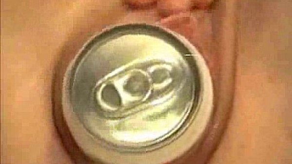 Sticking in a can of to satisfy the needs of her aching pussy