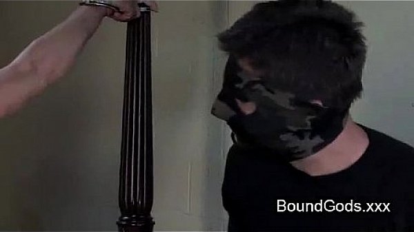 Bound gay giving blowjob to his partner and gets fucked from him in bed 