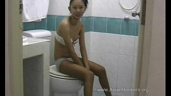 Thai Hooker Sucks Cock in the Toilet  
