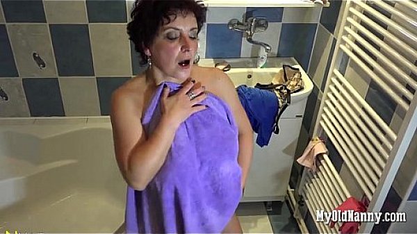 Big Breasted Mature Woman With Dildo