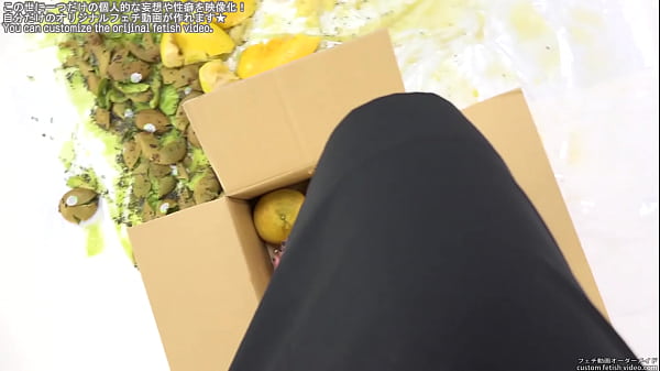 Woman stepping on fruits barefoot