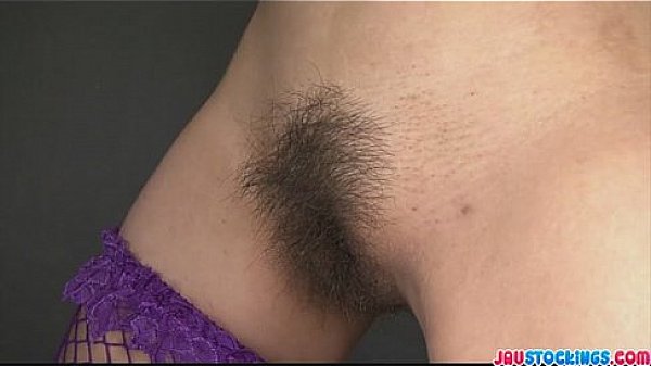 Kinky babe in fishnet stockings tied and fondled with sex toys