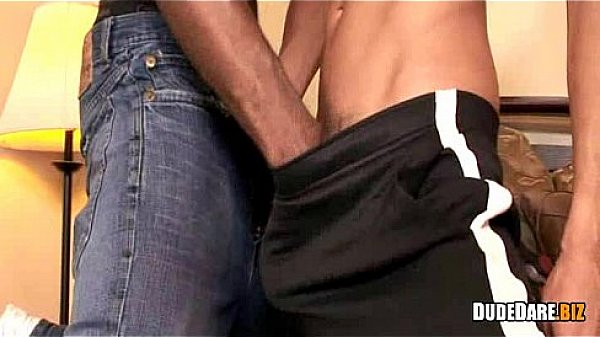 White Male touching an African Dick