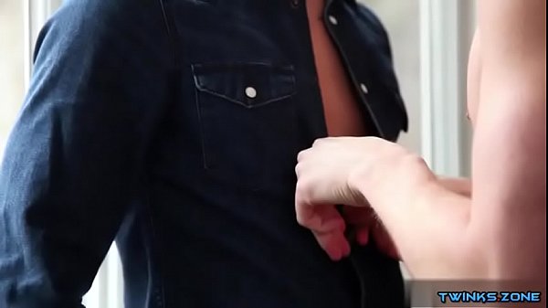 2 tattooed guys have fun at home.  