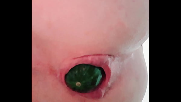 cucumber comes out of pink ass 