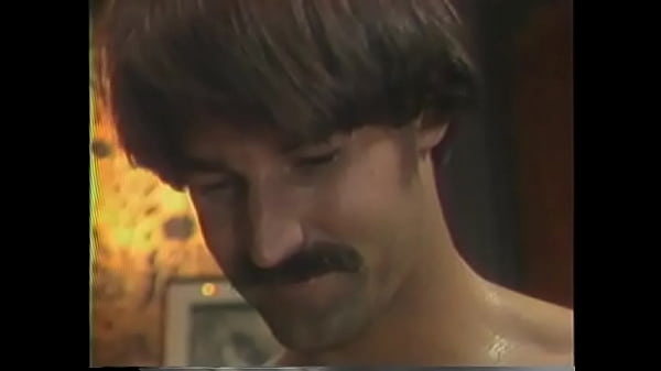 Nasty blonde Nina Hartley enjoys a wild orgy fucking  