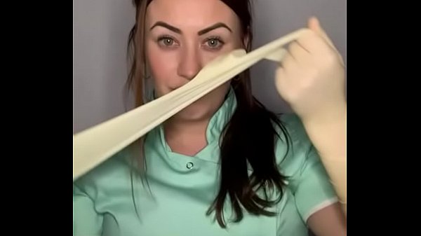 Mature cunt wearing tight latex Gloves 4