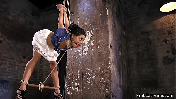 Small tits ebony slave Kira Noir bent over and gagged in mini skirt gets pussy fingered