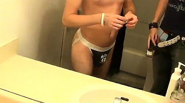 Gay guys William is attempting to tidy makeup off the bathroom mirror  