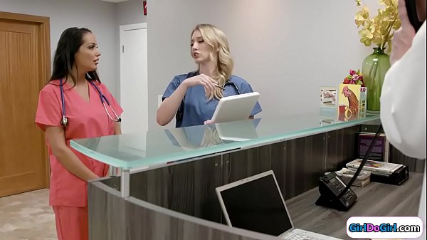 Blonde doctor shows her brunette intern around the hospital.She not really cheerful and the intern suggests to have some quality time right here to up her mood.She kisses the doctor sucks on her tits and licks her wet pussy.Then she facesits her 