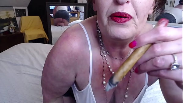 806 First time a cigar, heavy makeup and short skirt