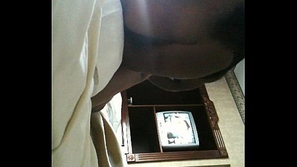 Black couple getting it in a hotel.