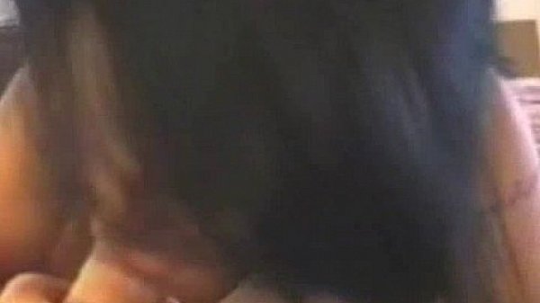 Asian wife giving blowjob  