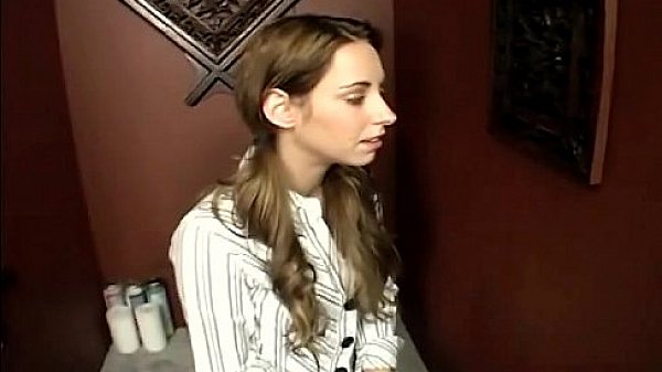 Shy brunette visits glory hole and sucks big cock