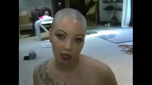 Bald girl obeys