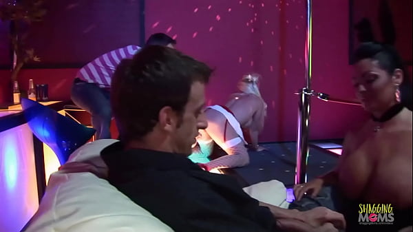 Christmas is the time for giving, and the strip club is no exception. The beautiful milfs strip down in front of their customers and spread their cheeks to reward them with hardcore anal group sex. 