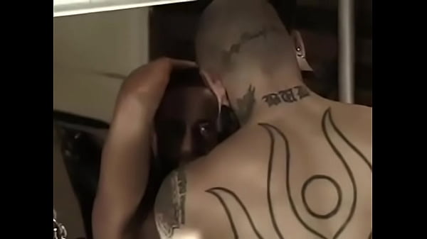 Pierced guy with heavy tattoos