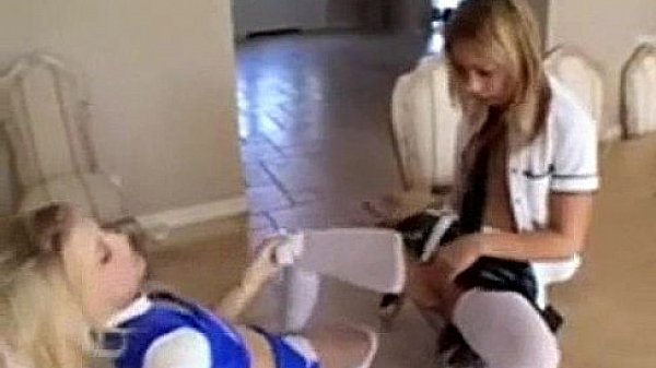 Two teens are pushing