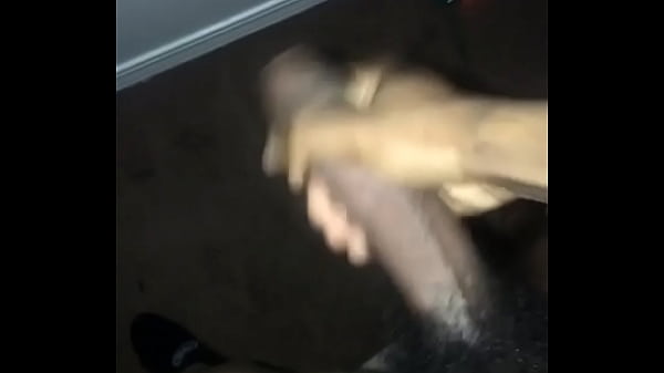 Black guy strokes his long black cock
