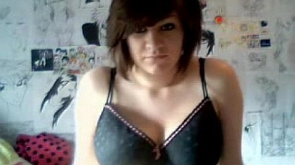 Busty amateur touches her breasts and nude body