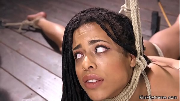 Bent over ebony slave Kira Noir gagged in rope bondage gets pussy rubbed 