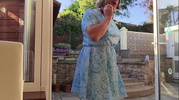 Transvestite Johanna puts water in garden feature