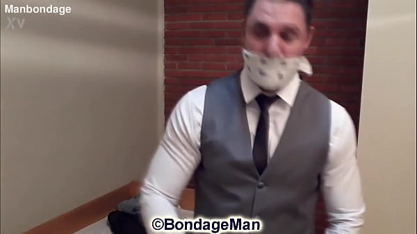 Peter gagged in suit backstage 
