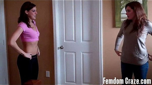 Fit babes Cherry and Sarah lifting each other up