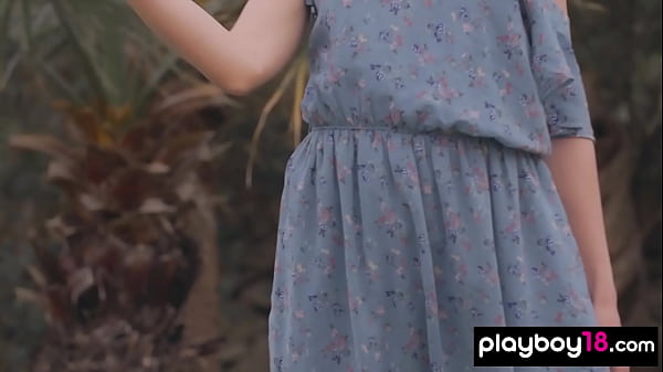 Skinny european beauty posing naked in her garden outdoor  