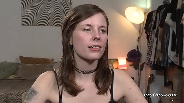 German Hottie with Piercings and Shaved Pussy Masturbates