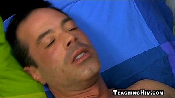 Shaggy hair twink getting ass fucked by a mature guy