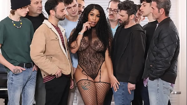 Wealthy Black Beauty Having Blowbang With a Dozen of White Hobos