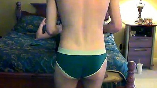 Nude men Trace and William make out and roll around on the sofa as 