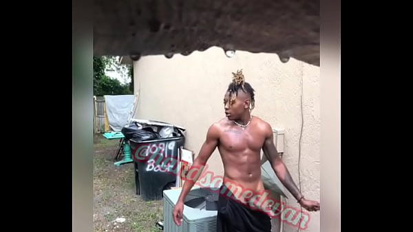 Handsomedevan strokes this cock in the rain