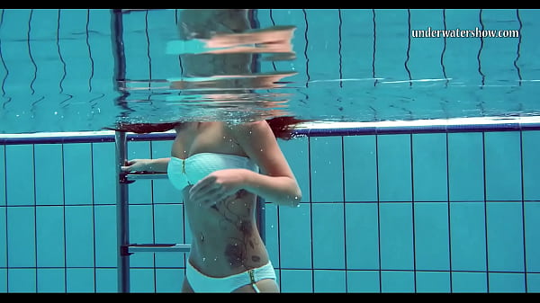 Sexy chick in the pool naked and horny big tits