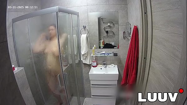 LUUV. A brunette showers, used to amateur cameras, showing her natural body 