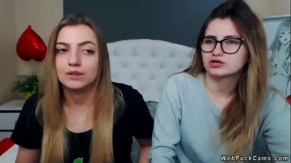 Two brunette amateur teen lesbian hotties stripping and tying in bed then licking in their private live webcam show on homemade footage 