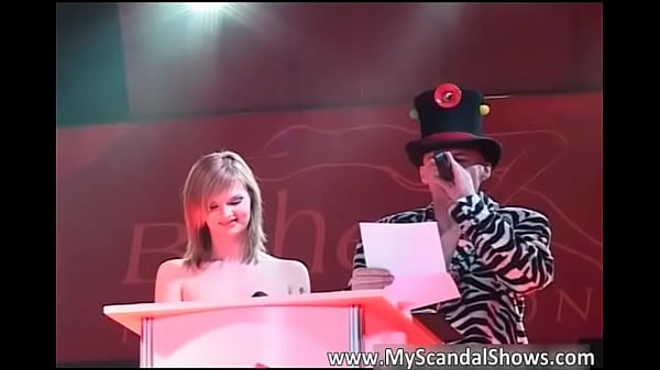 Sexy brunette babe receive award