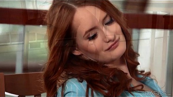 Beautiful redhead with sexy long legs masturbates