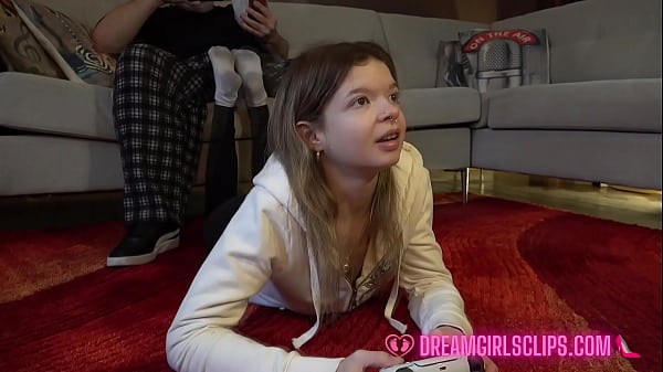 Hot young girl giving footjob and sockjob while playing video game foot fetish