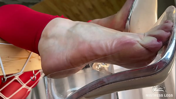 My bare wrinkled feet hang over you from above and my transparent shoes dangle on them