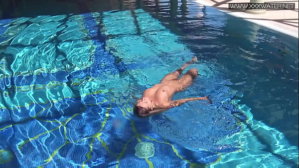 Red lingerie babe Mary Kalisy gets naked in the swimming pool