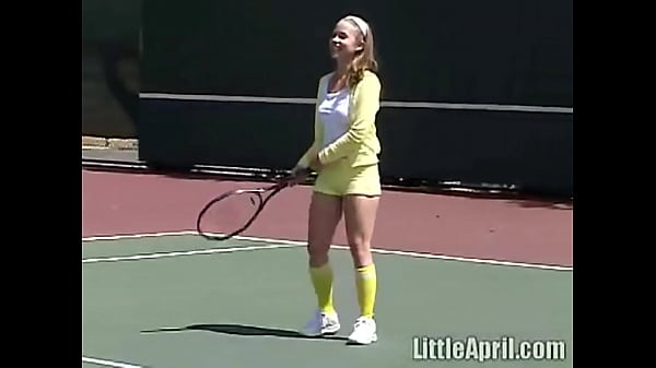 Little April plays tennis  