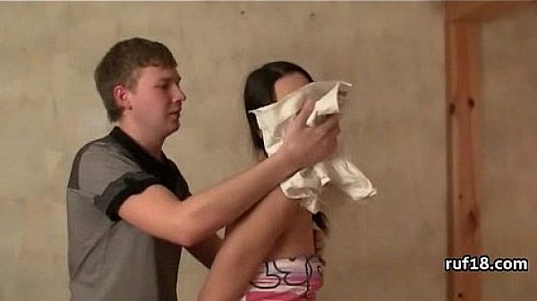 Teen Lucy in bondage is teased by horny guy