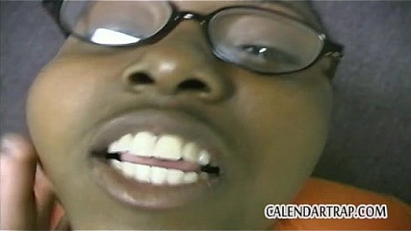 Black girl in glasses sucks white dick